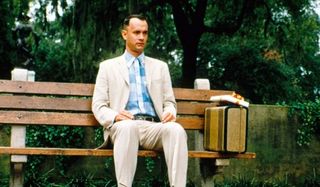 Forrest Gump Tom Hanks sits on his park bench, with his suitcase, waiting