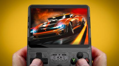 R36S Retro Gaming Handheld on a gold background