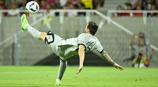 Lionel Messi scores with a wonderful over head kick for PSG against Clermont Foot.