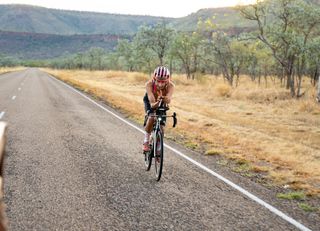 Lachlan Morton (EF Education-EasyPost) on the straight open roads on Day 12 of his around Australia record attempt