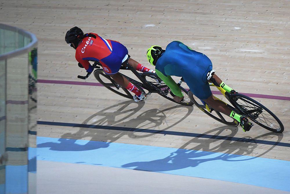 Cuba's Marlies Mejias Garcia (L) and Brazil's Gideoni Monteiro