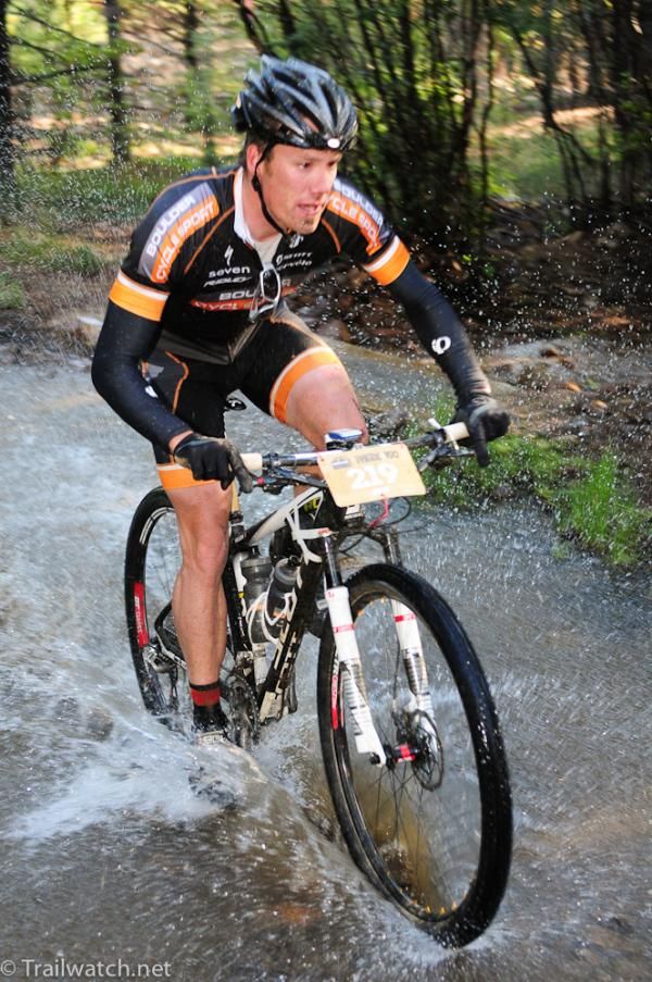 Kristopher Neilsen passing through a water crossing