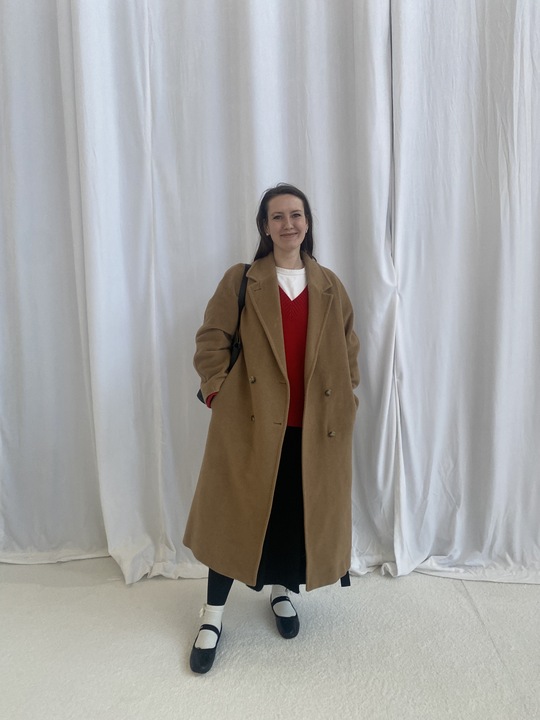 Halie LeSavage wearing the same Miu Miu Ballet flats as Olivia Rodrigo during fashion week