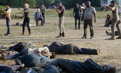 The controversial last sequence of &amp;quot;The Walking Dead&amp;quot; midseason finale was one of the best scenes on TV all year, critics say.