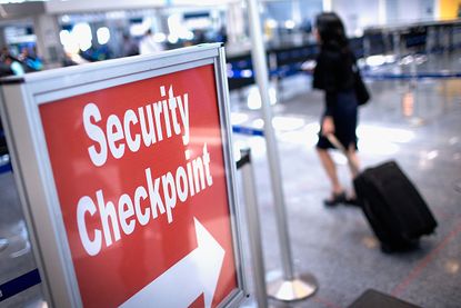 TSA security checkpoint sign.