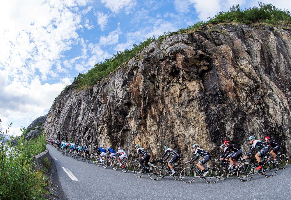 Cyclists ride during the 198,5 km second stage of the Arctic Race of Norway between Mo i Rana and Sandnessjoen