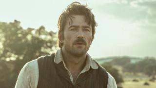 Spencer Dutton outside with messy hair in 1923