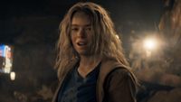 Kara Zor-El (Milly Alcock) speaks after taking out foes in Supergirl.