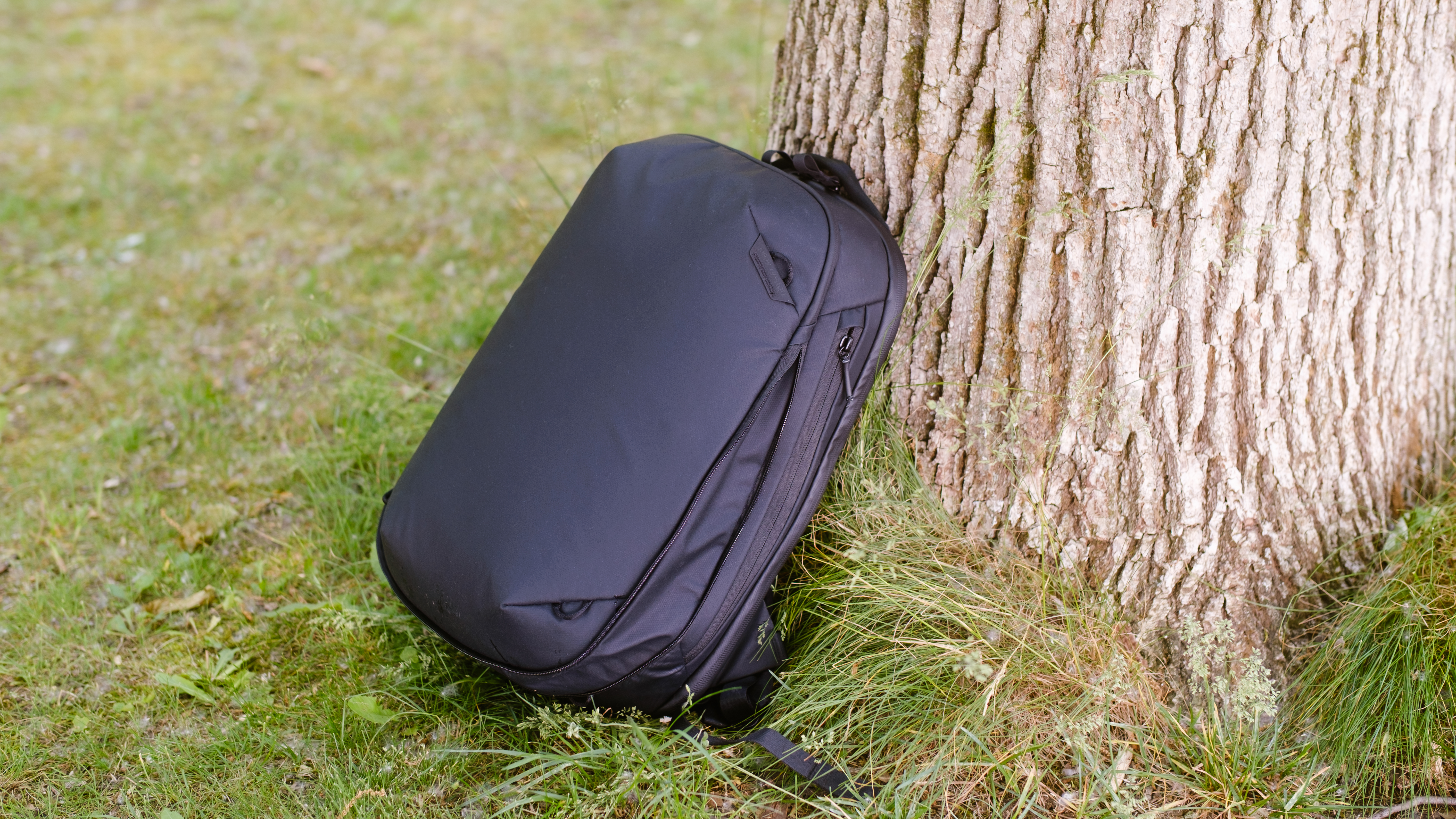 The Peak Design Travel Backpack 20L in use by a photographer