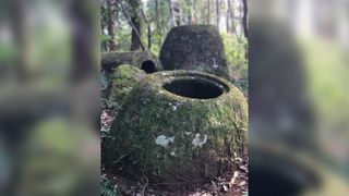 Some of the stone jars are thought to be more than 3000 years old, but most of the burials found in the ground around them seem to be up to 2,000 years younger.