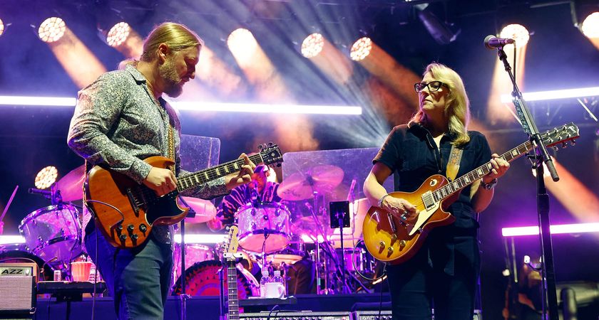 Derek Trucks and Susan Tedeschi perform live in 2023, with Trucks playing his Dickey Betts Artist Series SG, Tedeschi playing her Les Paul Standard.