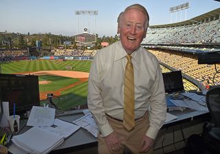 Vin Scully in Dodger Stadium broadcast booth in 2016