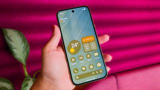The colorful themed home screen of the Google Pixel 11