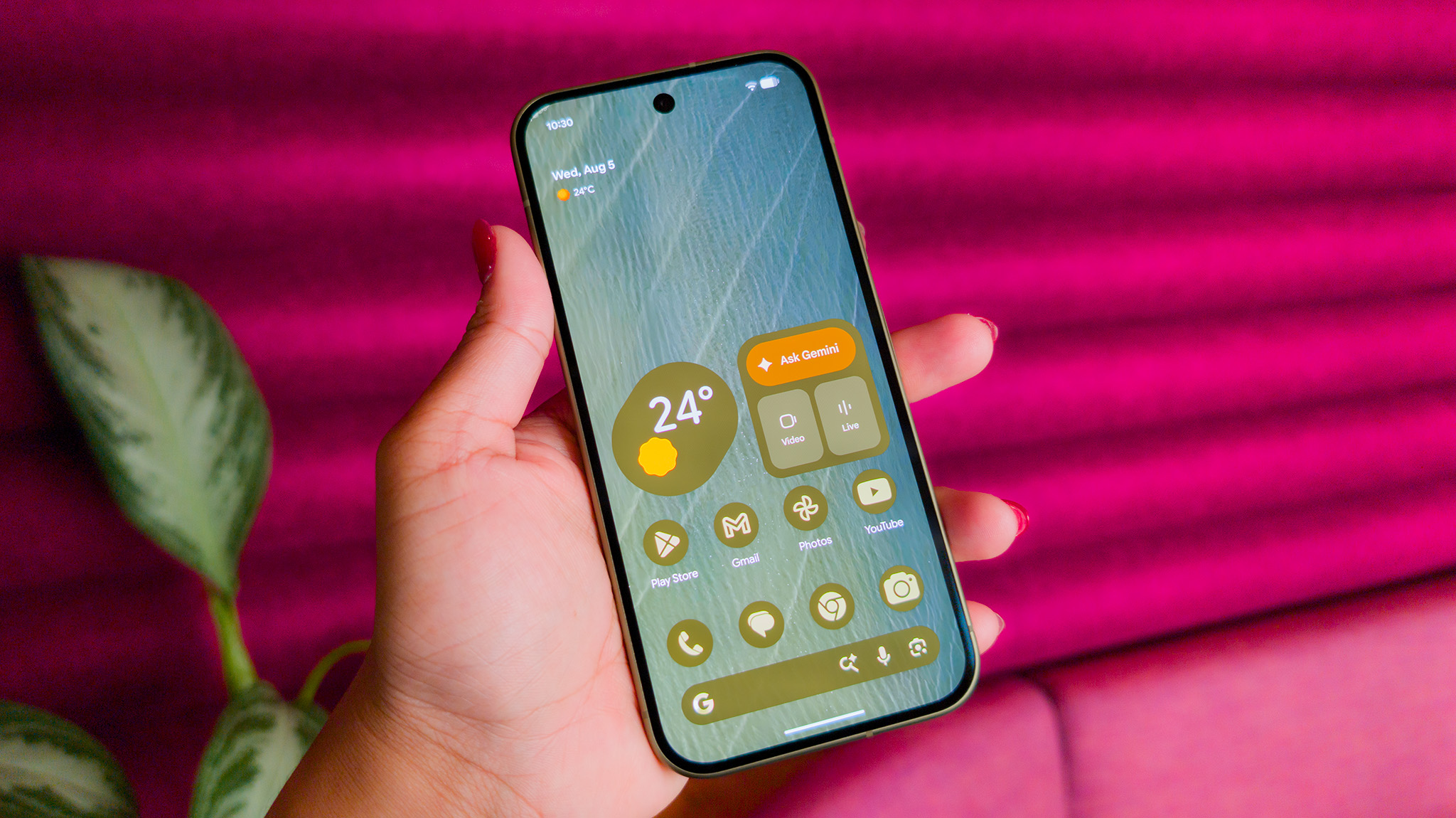 The colorful themed home screen of the Google Pixel 11