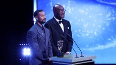 Michael B. Jordan and Delroy Lindo present the Special Visual Effects Award on stage during the EE BAFTA Film Awards 2026