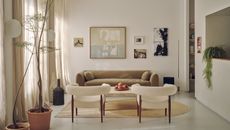 interior of London apartment featuring organic materials, tall windows and neutral, natural colours