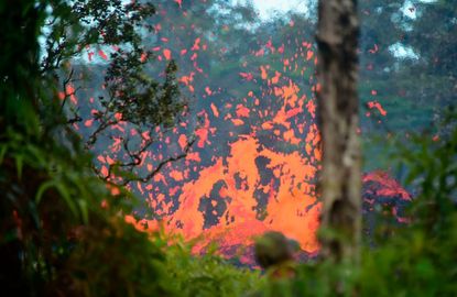 Lava is seen coming from a fissure in Leilani Estates subdivision on Hawaii's Big Island on May 4, 2018.