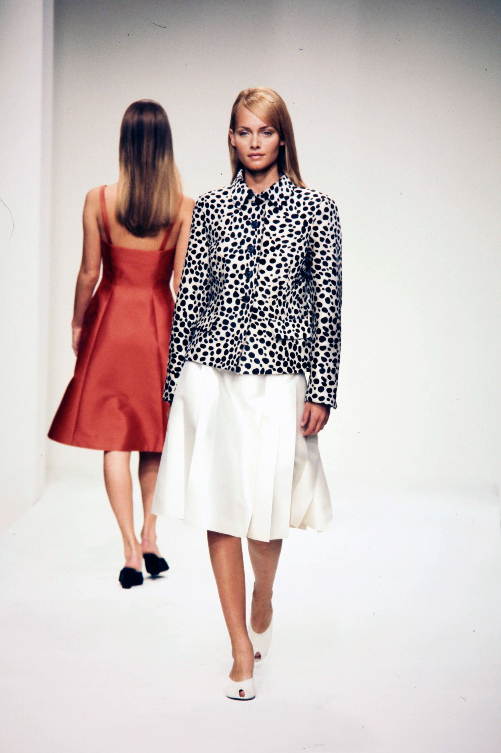 Model Amber Valletta walks in the Prada Fall 1995 Ready to Wear Runway Show on March 9, 1995, in Milan, Italy.