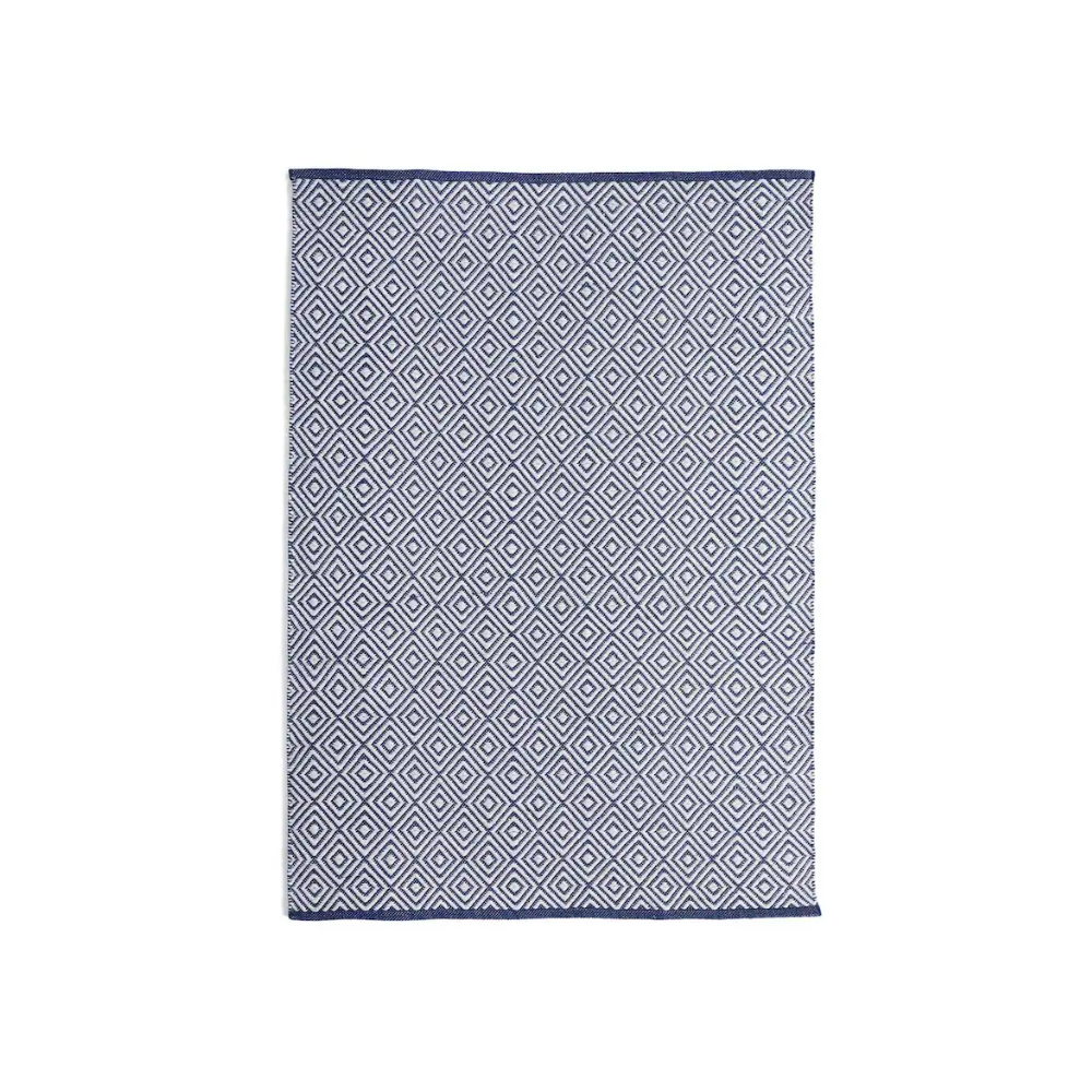 Navy and white diamond print rug