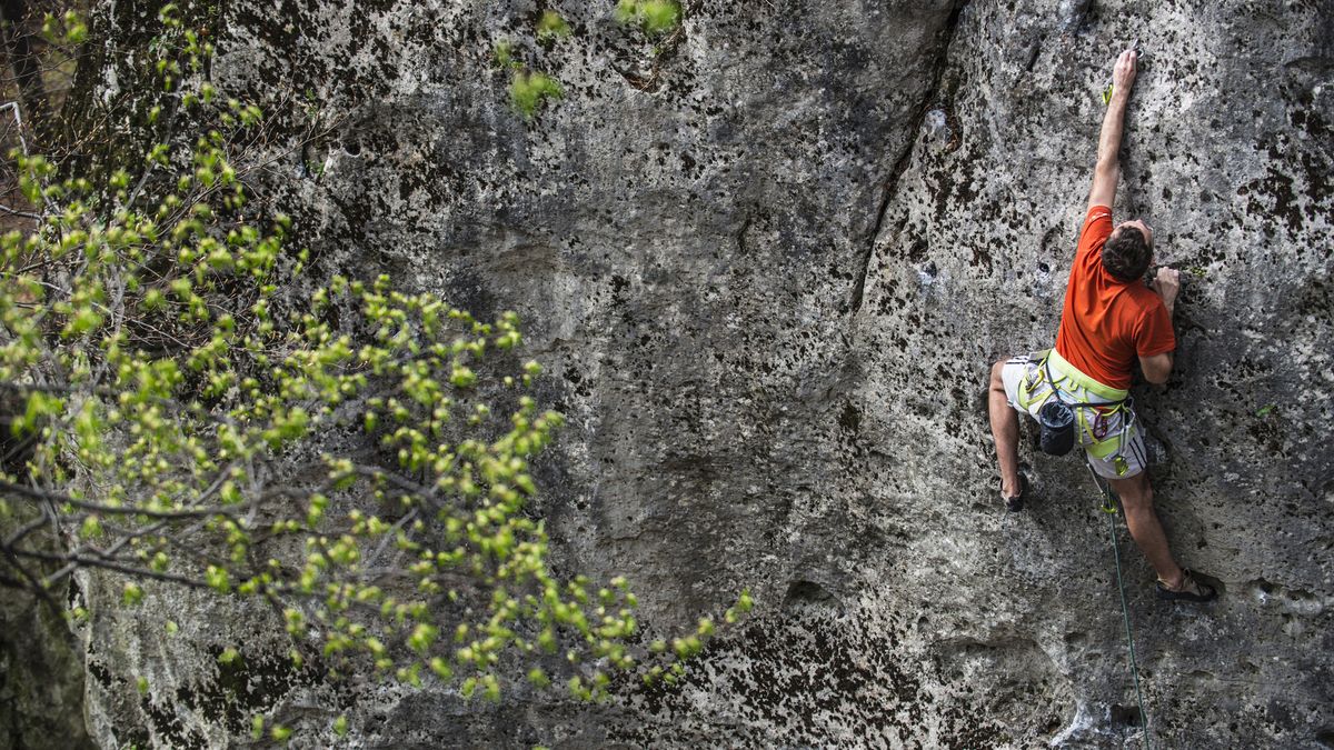 6 spring rock climbing tips: climber on crag