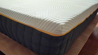 Emma Luxe Pro Mattress uncovered and showing a view of the corner