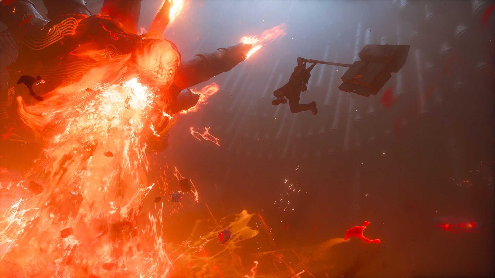 A huge orange fireball engulfs the left side as a silhouetted figure and debris fly through a smoky, beam-lit sky, creating a chaotic sci-fi scene.