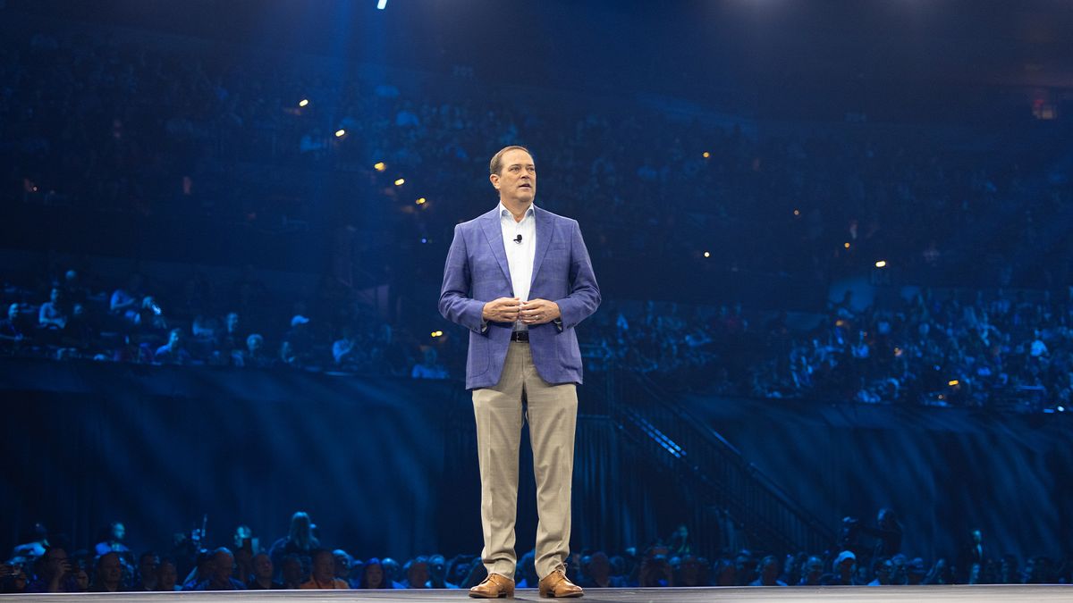 Cisco CEO Chuck Robbins pictured on stage during the Cisco Live 2024 opening keynote presentation.