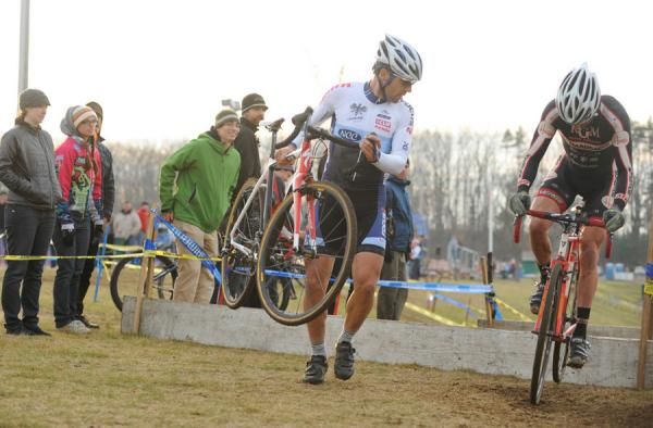 Al Donohue watches as Christian Favata hops the barriers