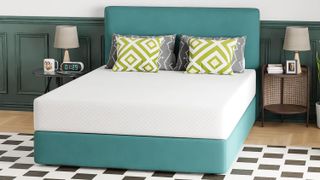 The FDW Gel Memory Foam Mattress on a bed frame in a bedroom