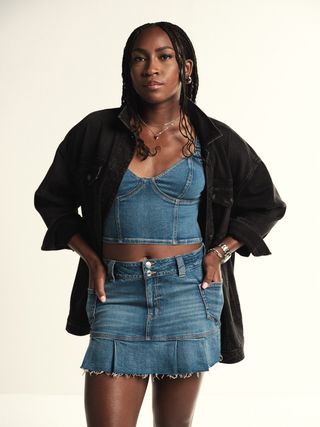 Coco Gauff poses in American Eagle's new ad campaign in a denim tank top and matching skirt.