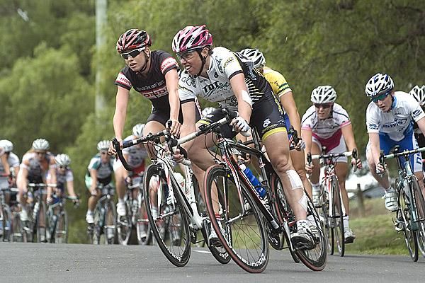 A patched-up Jenny MacPherson (Race) leads the peloton around during race two of the women's series.