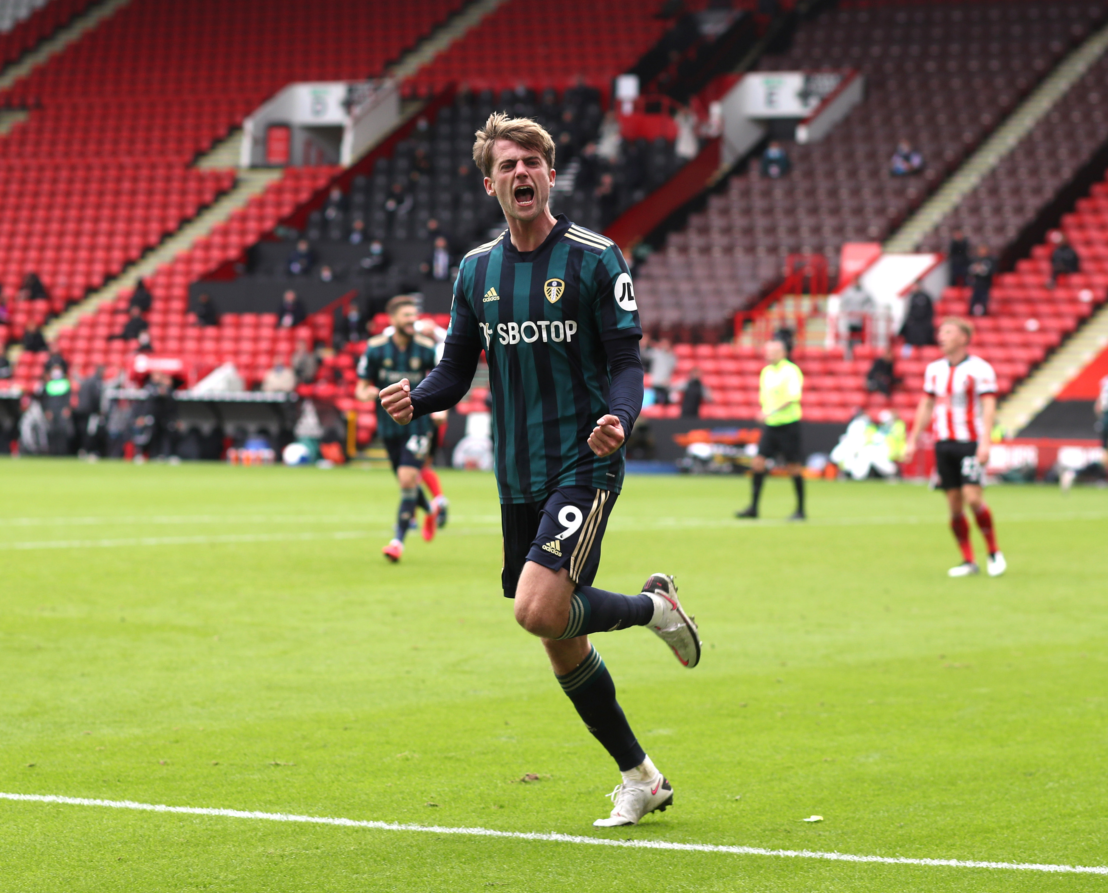 SHEFFIELD, ENGLAND - SEPTEMBER 27: Patrick Bamford of Leeds celebrates after scoring the only goal of the match during the Premier League match between Sheffield United and Leeds United at Bramall Lane on September 27, 2020 in Sheffield, United Kingdom. Sporting stadiums around the UK remain under strict restrictions due to the Coronavirus Pandemic as Government social distancing laws prohibit fans inside venues resulting in games being played behind closed doors. (Photo by Mark Leech/Offside/Offside via Getty Images)