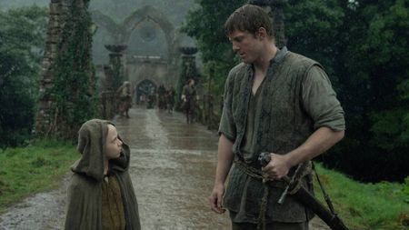 Peter Claffey as Dunk and Dexter Sol Ansell as Egg talking in the rain in A Knight of the Seven Kingdoms season 1