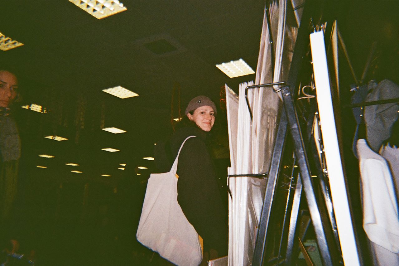 A photo of a woman taken on a Novocolor Swiss+Go 35mm film camera