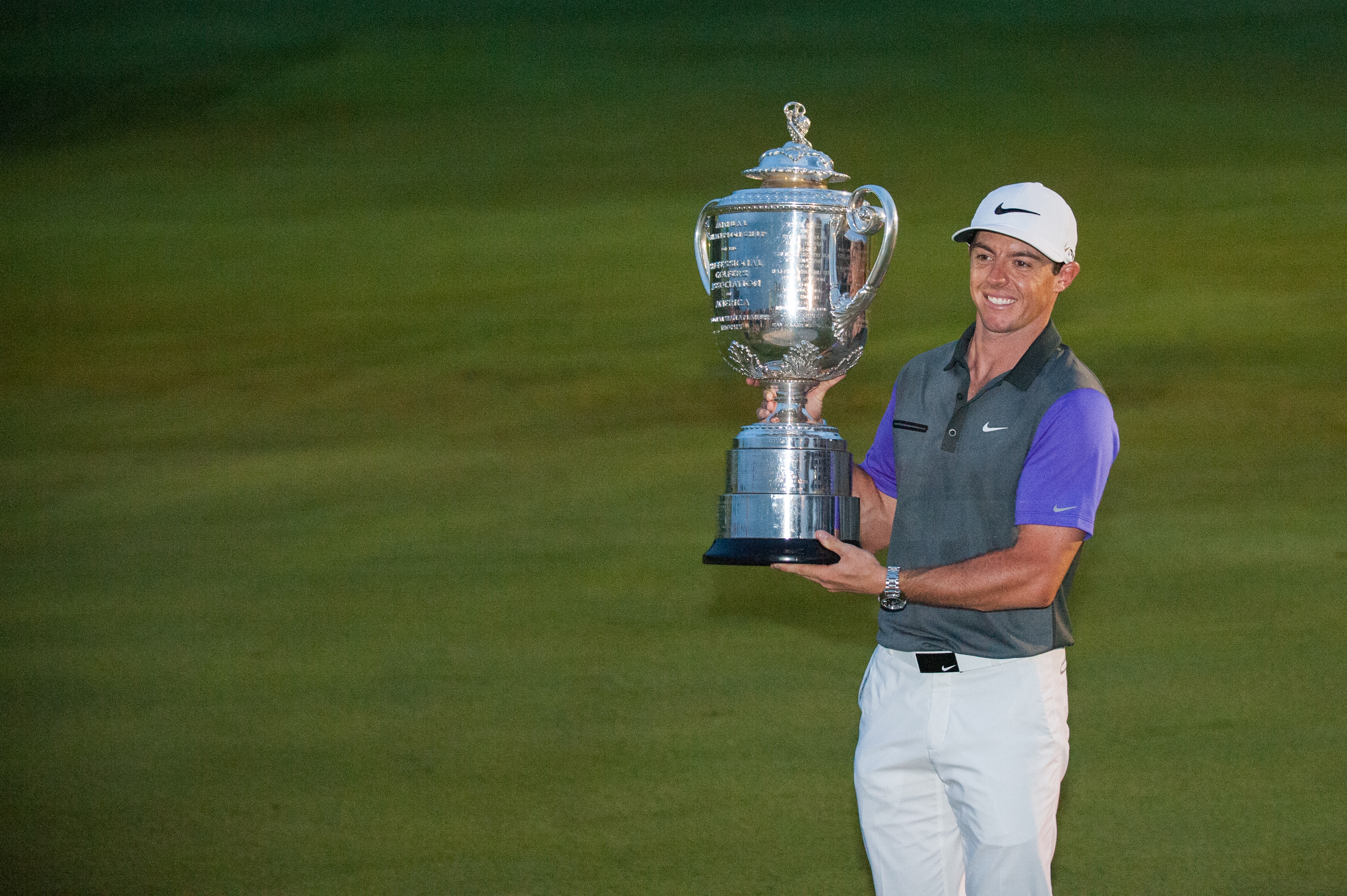 Rory McIlroy with the Wanamaker Trophy in 2014