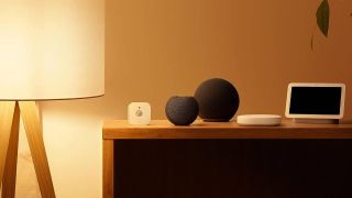A smart sensor next to other smart hub devices