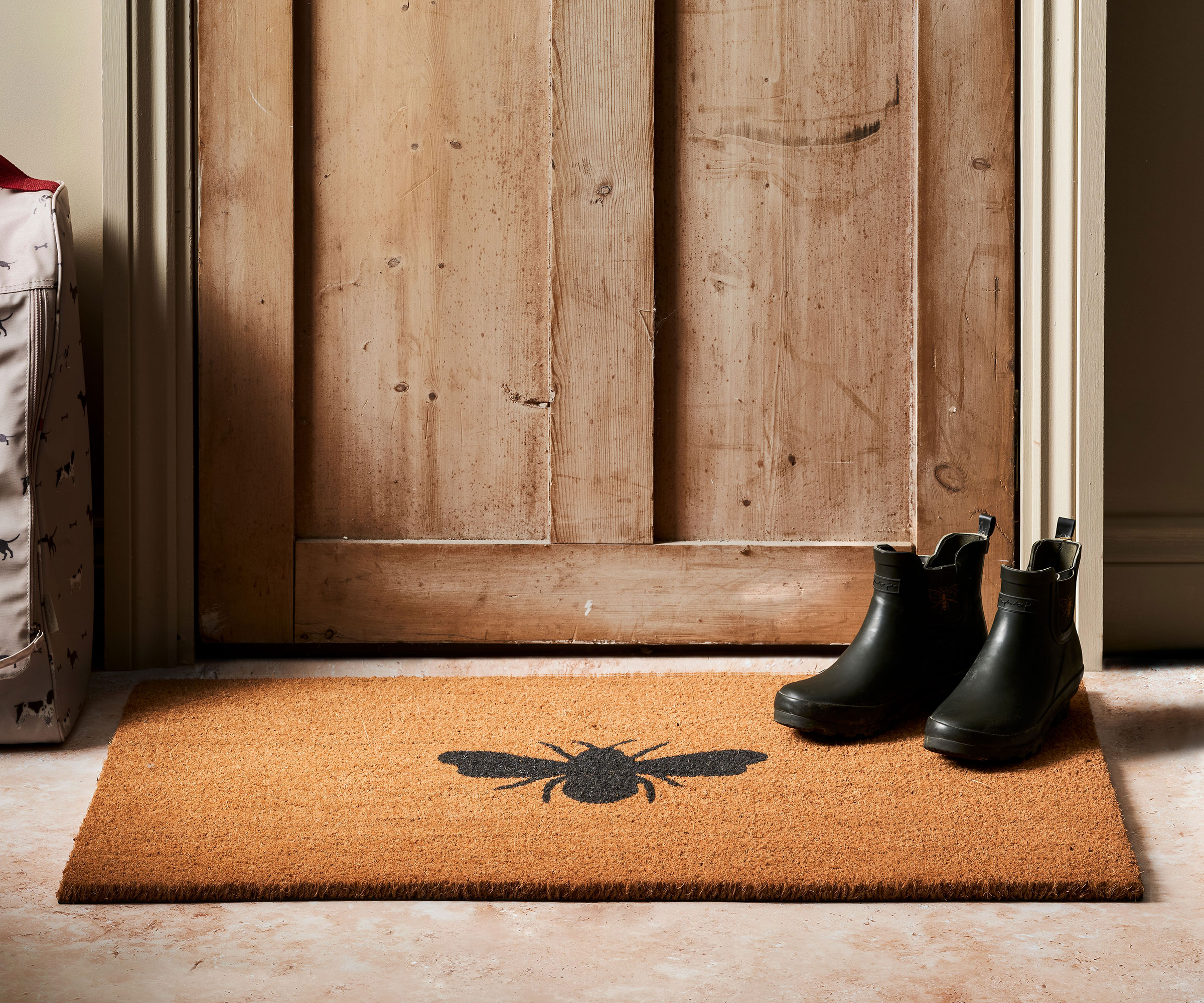 coir doormat with bee design