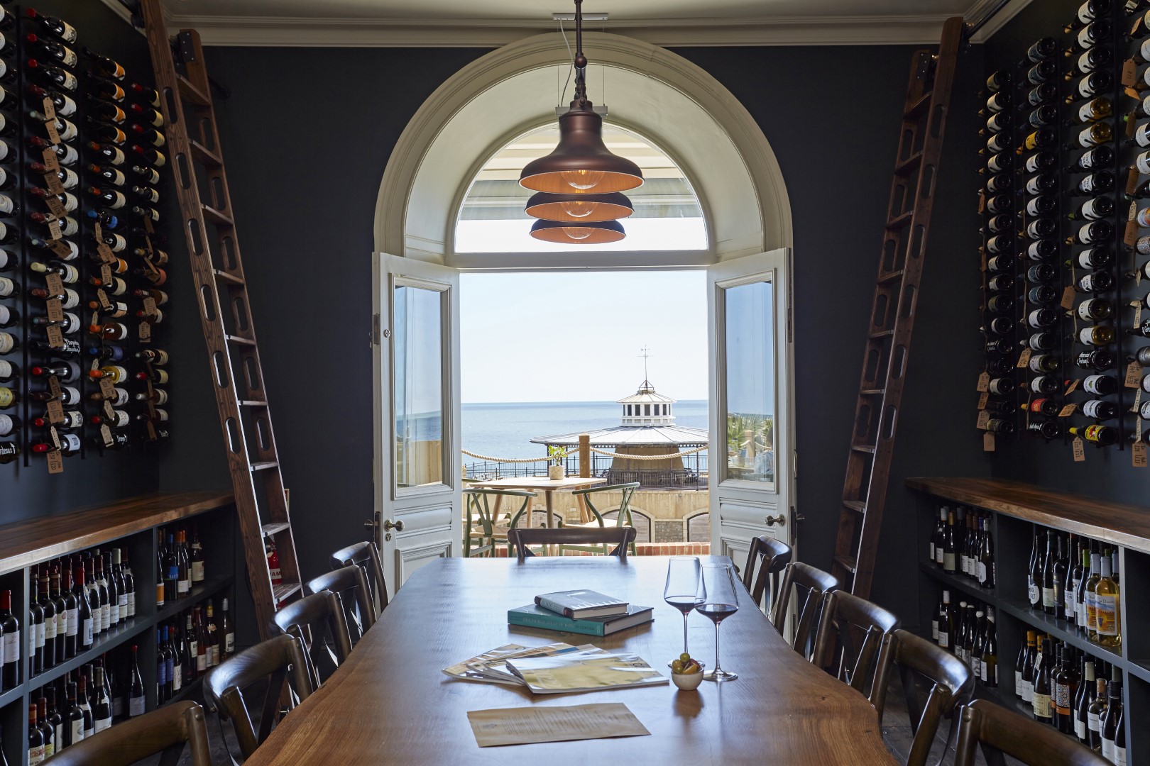 Photo of wine cellar looking out onto the terrace at The Terrace Rooms & Wine, Ventnor
