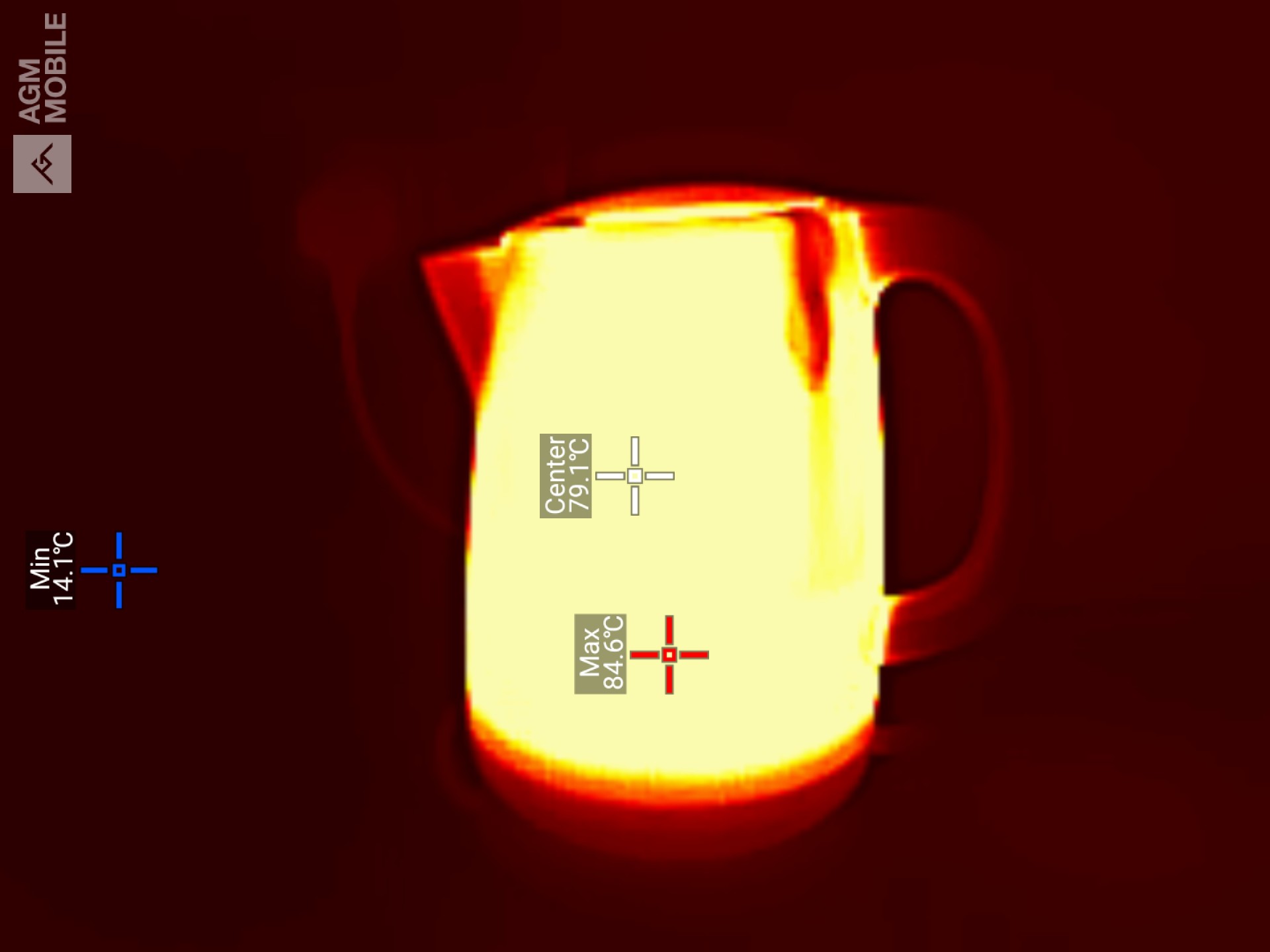 A thermal image of a heated electric kettle showing a maximum temperature of 84.6&deg;C near the base and a center temperature of 79.1&deg;C on the main body.