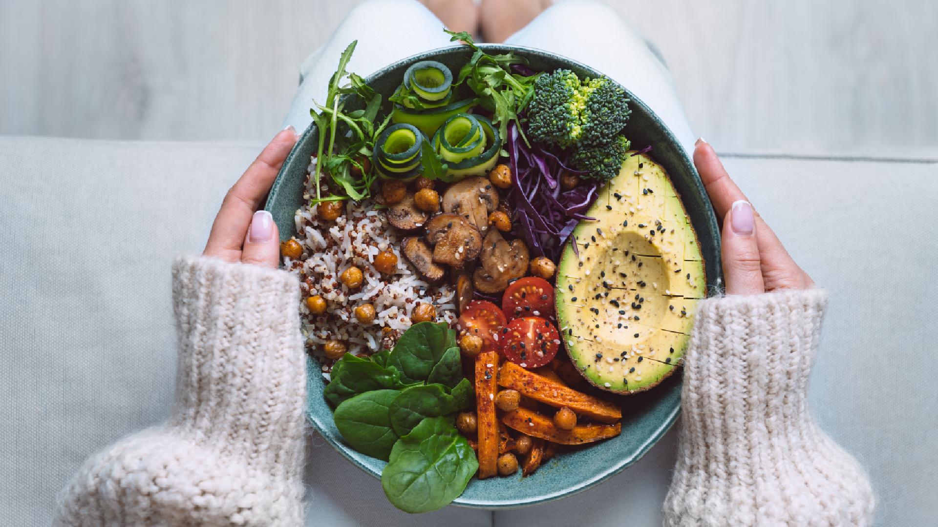 woman holding salad bowl
