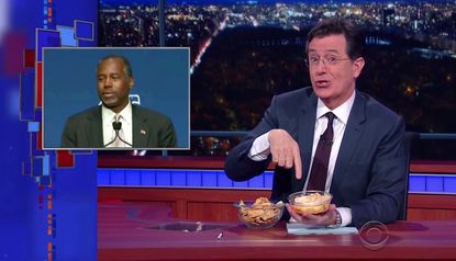 Stephen Colbert studiously ignores Donald Trump to mock Carson, Clinton, Bush