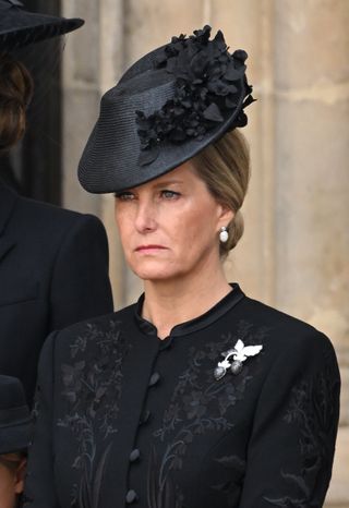 Duchess Sophie wearing a black coat with a black hat at Queen Elizabeth's funeral