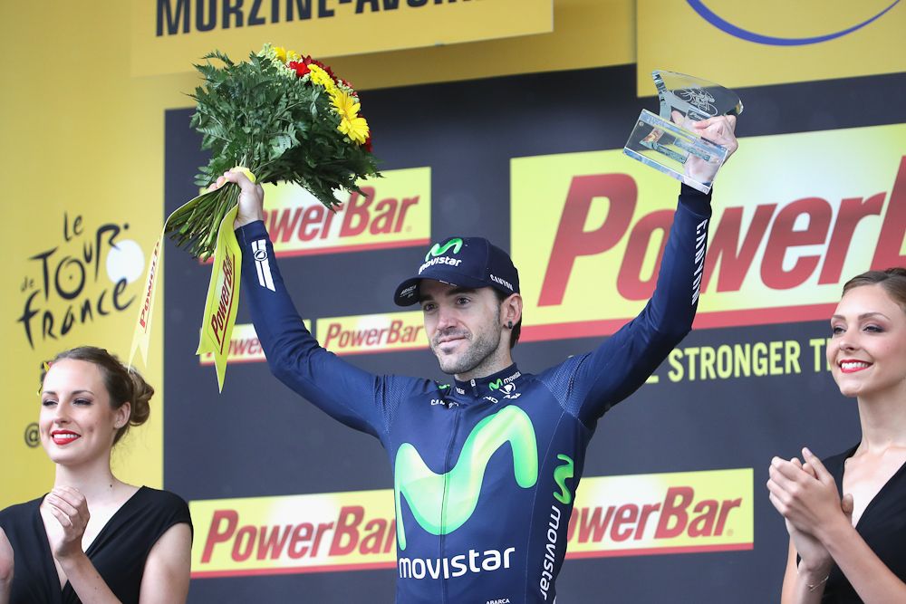 Ion Izagirre on the Tour de France podium after winning stage 20