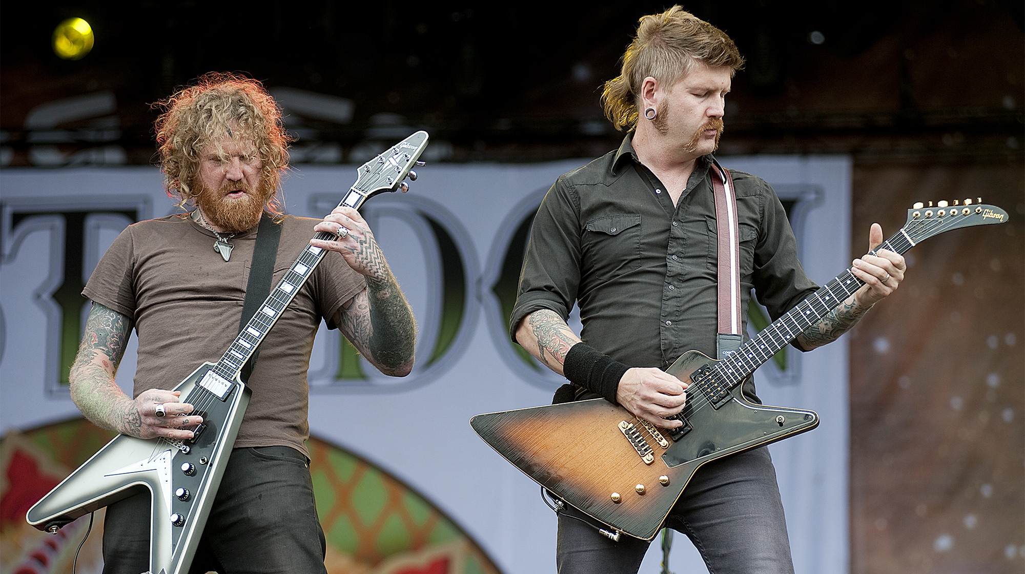 Brent Hinds (L) and Bill Kelliher of Mastodon perform live on stage at Sonisphere Festival on July 10, 2011.