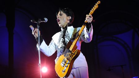 US singer Prince performs on October 11, 2009 at the Grand Palais in Paris. Prince has decided to give two extra concerts at the Grand Palais titled "All Day/All Night" after he discovered the exhibition hall during Karl Lagerfeld's Chanel fashion show. AFP PHOTO BERTRAND GUAY (Photo credit should read BERTRAND GUAY/AFP via Getty Images)