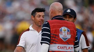 Rory McIlroy and Joe LaCava at the Ryder Cup Saturday afternoon fourball match