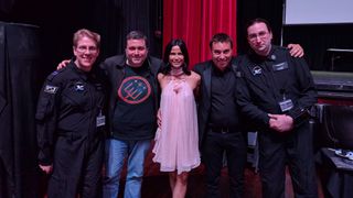 Fans (far left and right) pose for a photo with CIG's Erin Roberts, Sandi Gardiner, and Chris Roberts. Image via Sandi Gardiner.