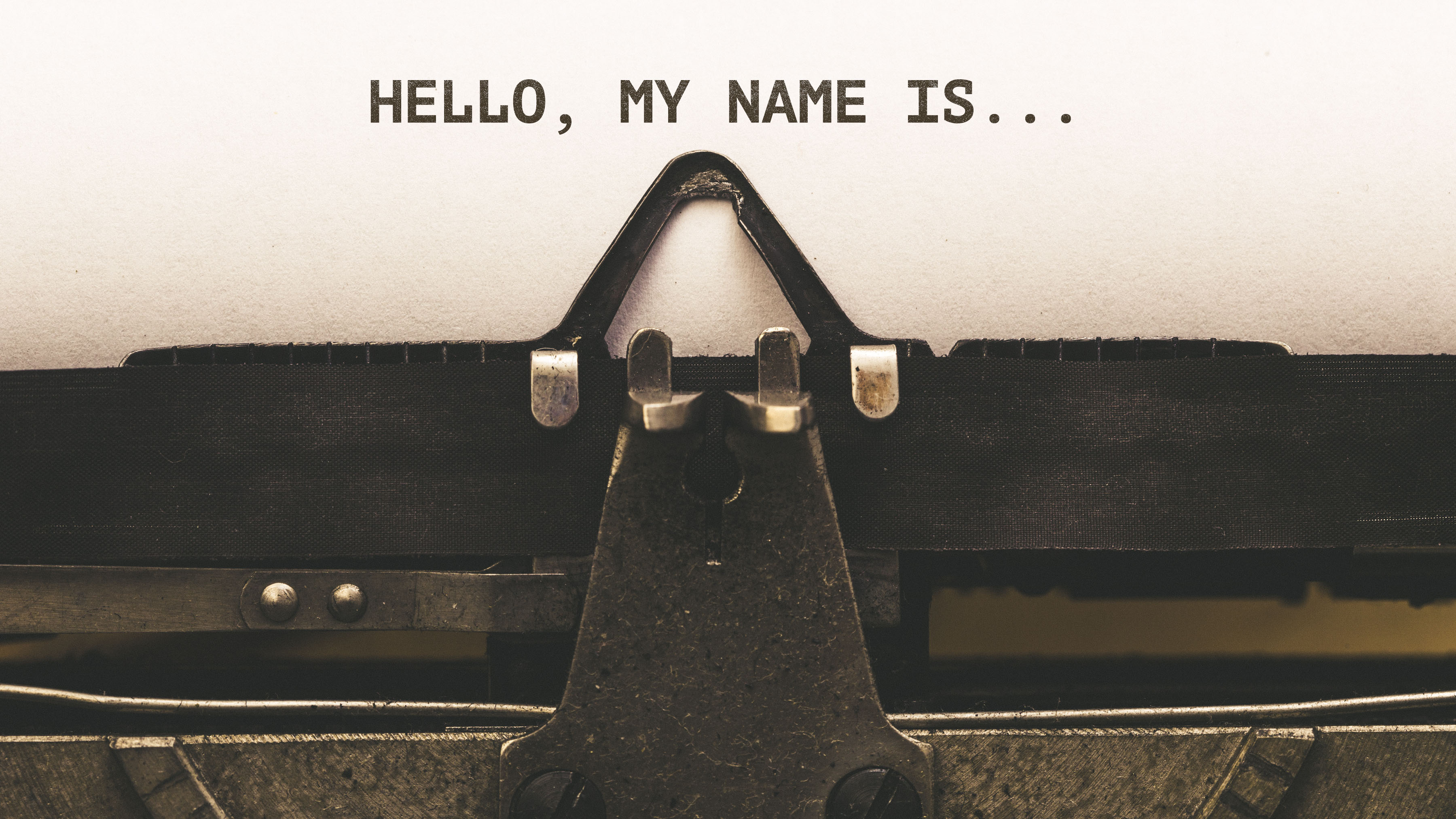Hello, my Name is, Text on paper in Vintage type writer machine from 1920s closeup with paper