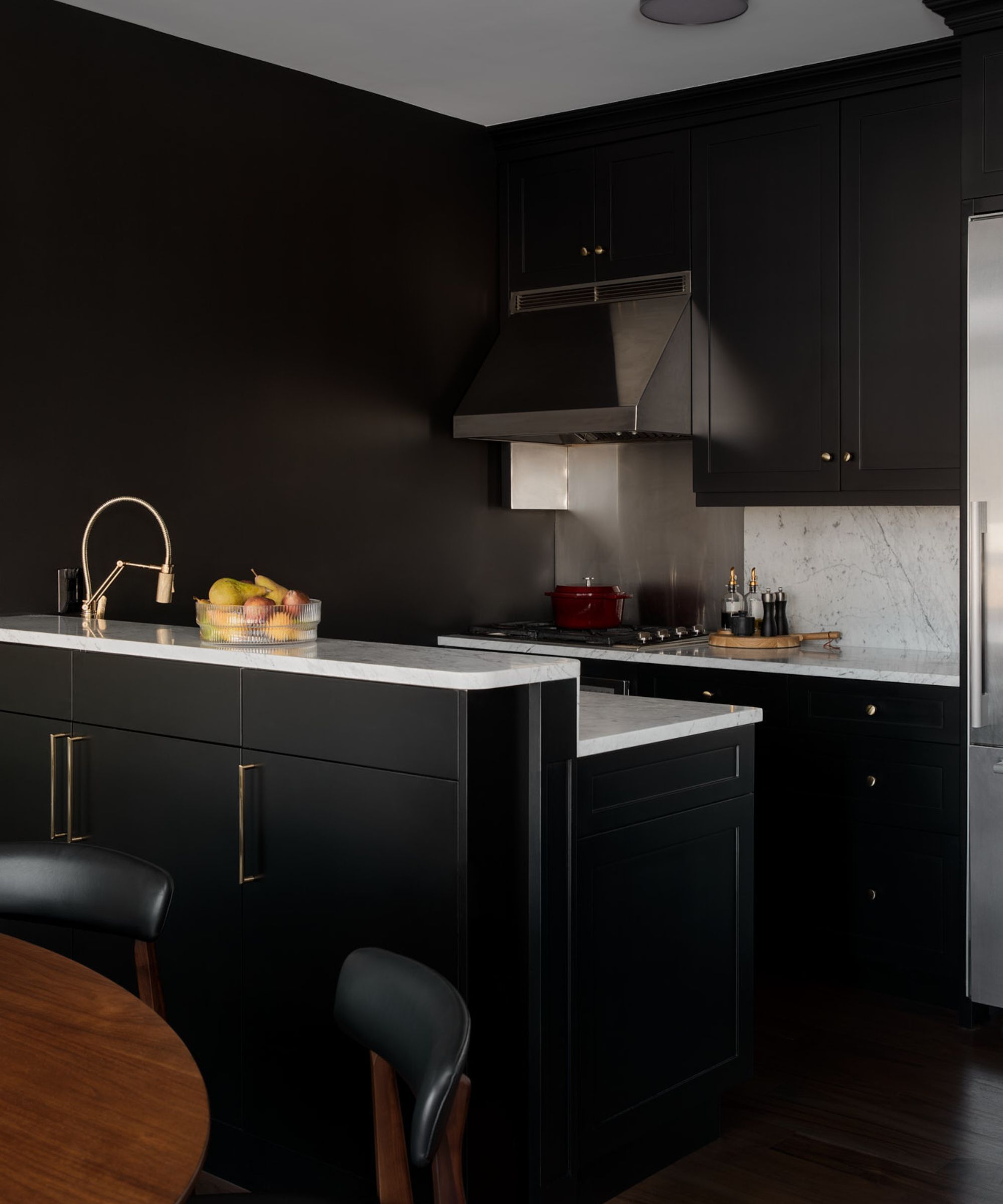 A small kitchen painted in Benjamin Moore's Black HC-190