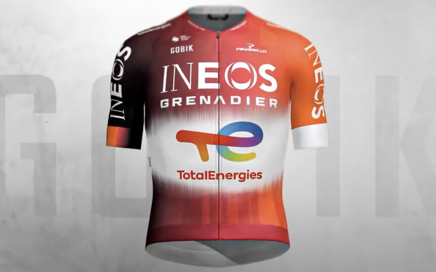 A computer generated image of Ineos Grenadiers&#039; new jersey, an orange design with a white fade area showing the TotalEnergies logo